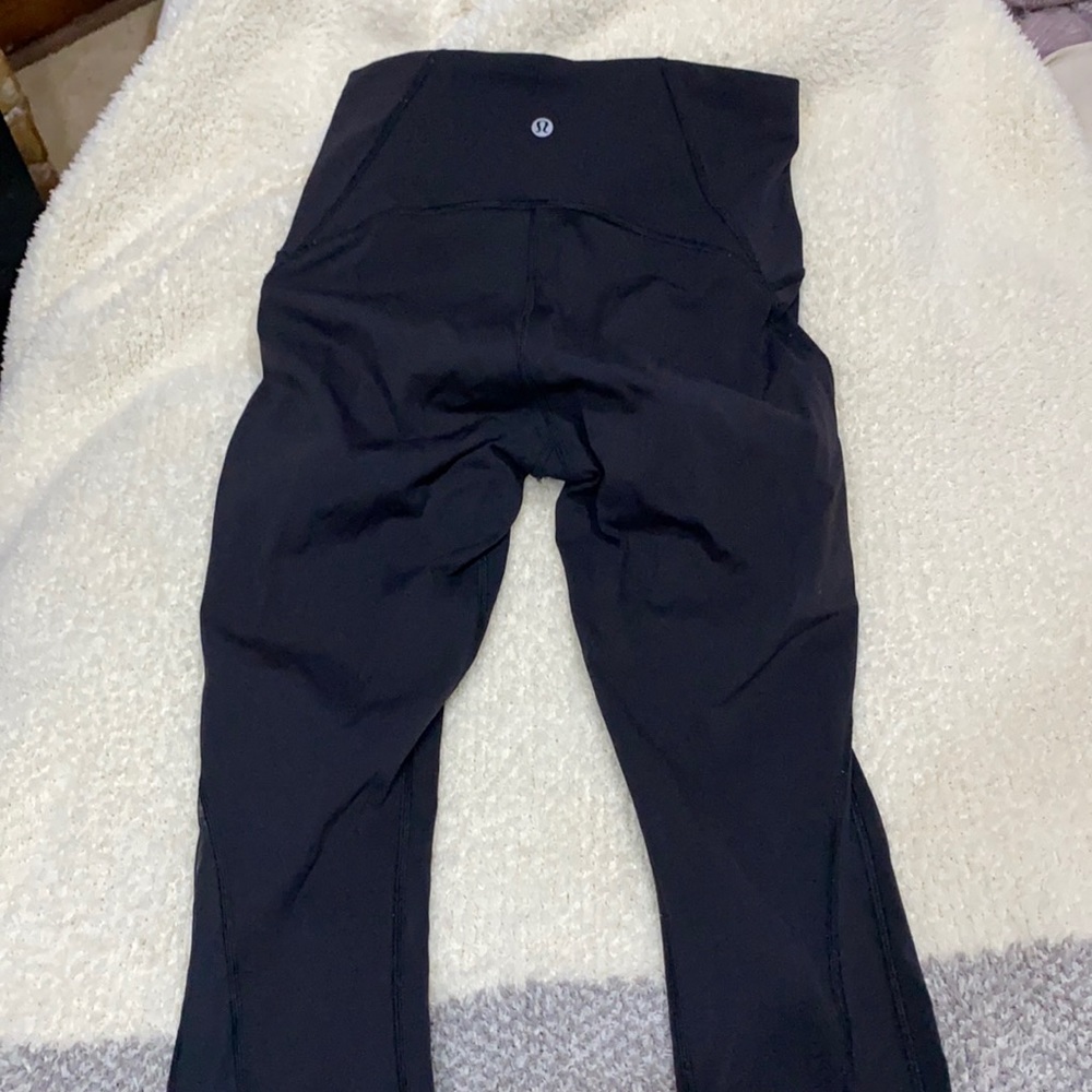 Lululemon 7/8 leggings with mesh detail on the back, gently worn.
